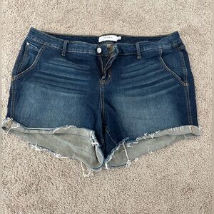 Torrid Jean cuttoff shorts.